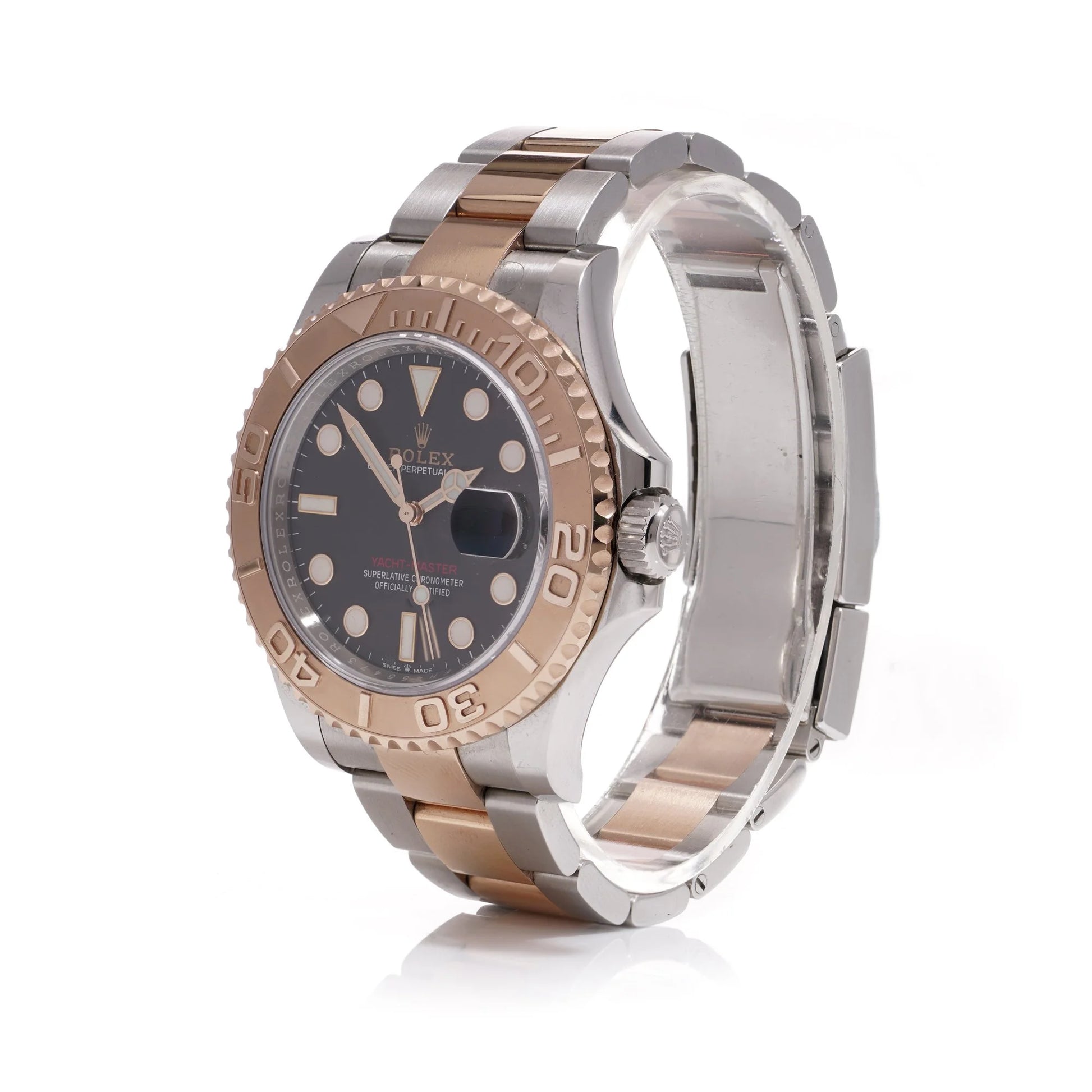 A Rolex Yacht-Master black dial wristwatch in steel and rose gold, on a white background