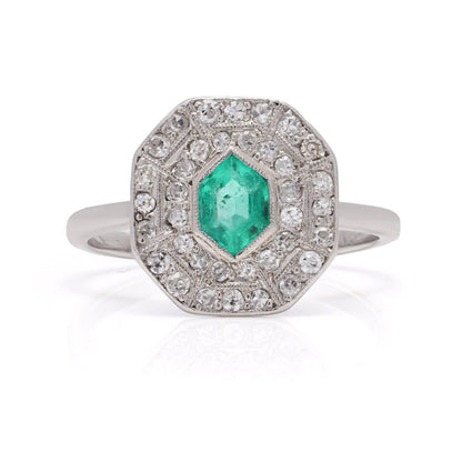 Art Deco emerald and diamond cluster ring in white gold.