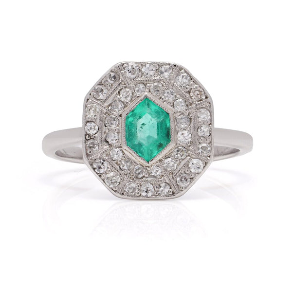 Art Deco emerald and diamond cluster ring in white gold.