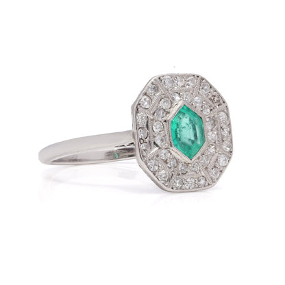 Art Deco emerald and diamond cluster ring in white gold.