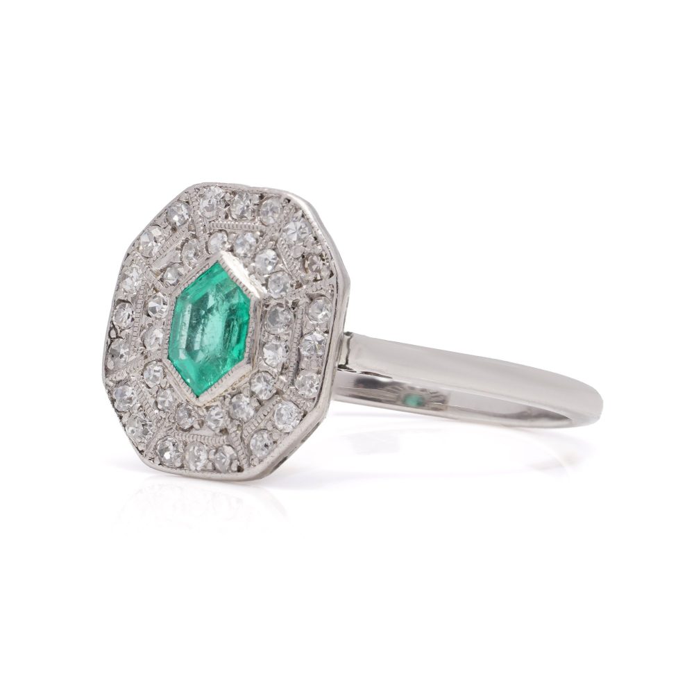 Art Deco emerald and diamond cluster ring in white gold.