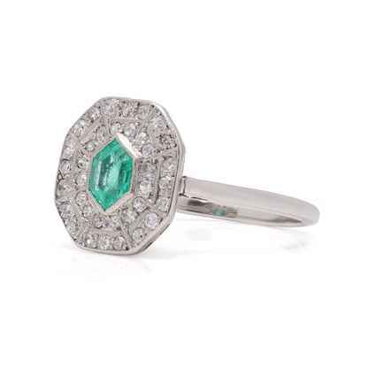 Art Deco emerald and diamond cluster ring in white gold.