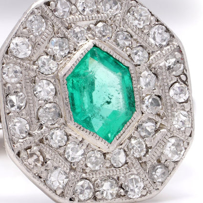 Art Deco emerald and diamond cluster ring in white gold.