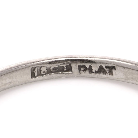 Diamond and pearl cluster ring in platinum and gold.