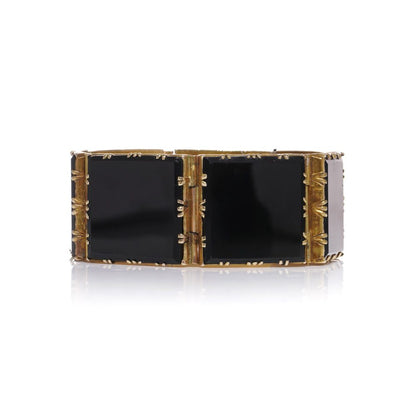 Gold and onyx memorial plaque link bracelet.