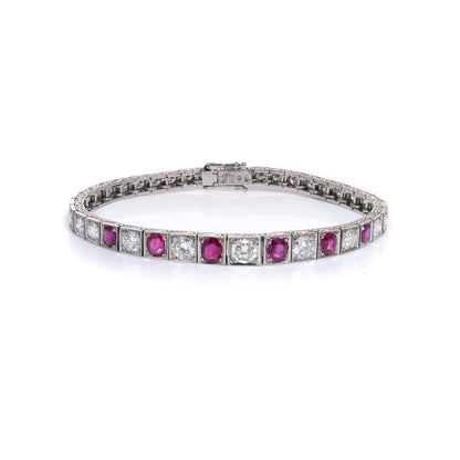 Natural Burma Ruby and Diamond Line Bracelet in Platinum, individual square shaped articulated links set with 4.65cts round brilliant-cut diamonds and 2.22cts oval natural no heat Burma rubies