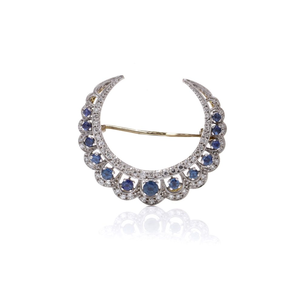 Edwardian sapphire and diamond crescent brooch in gold 
