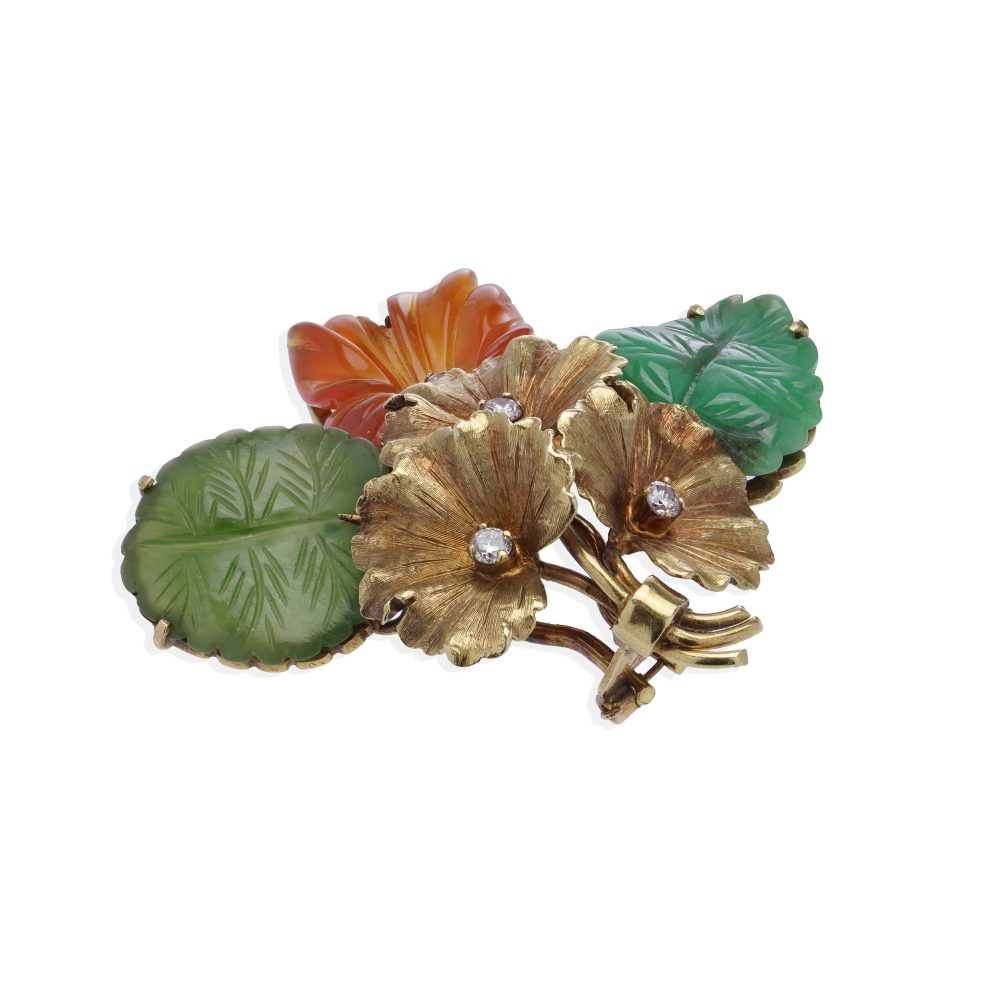 Tiffany & Co. vintage floral earrings in gold and gemstones.