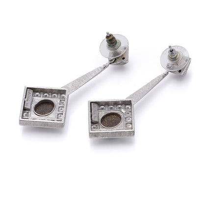 Opal and diamond earrings in white gold.