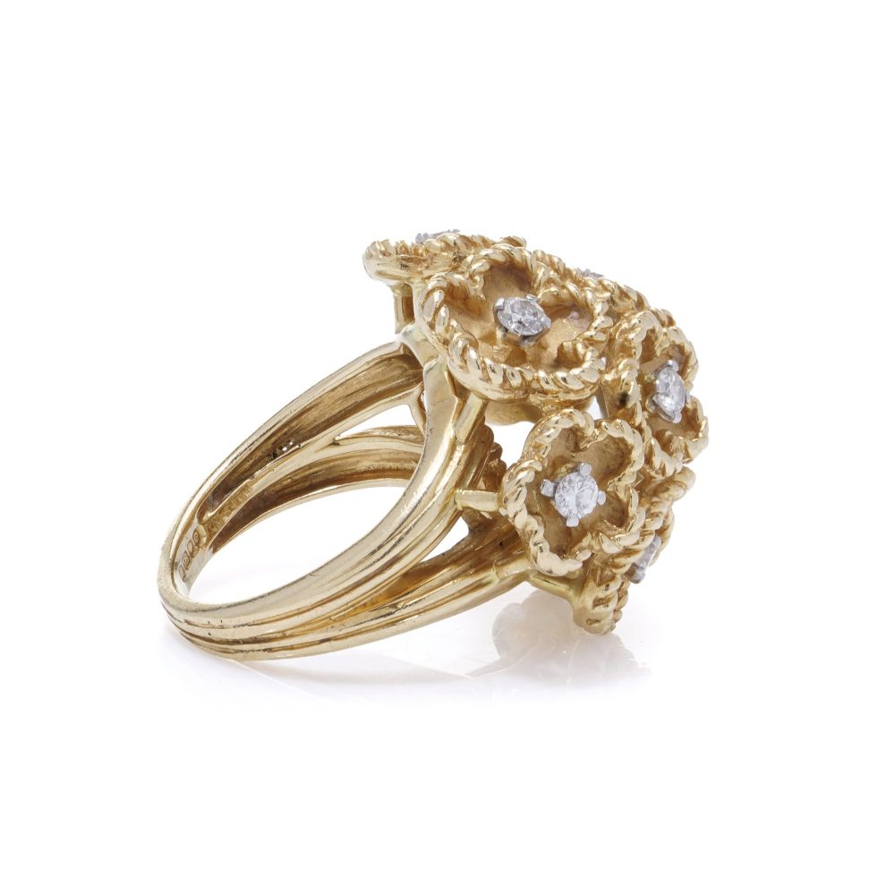 Vintage Kutchinsky Diamond Set 18ct Gold Flower Bombe Cocktail Ring, 18ct yellow gold floral cluster pattern with gold textured petals around diamond centres. Fully hallmarked, London 1977