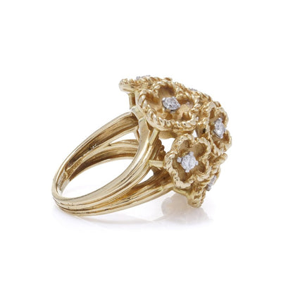 Vintage Kutchinsky Diamond Set 18ct Gold Flower Bombe Cocktail Ring, 18ct yellow gold floral cluster pattern with gold textured petals around diamond centres. Fully hallmarked, London 1977