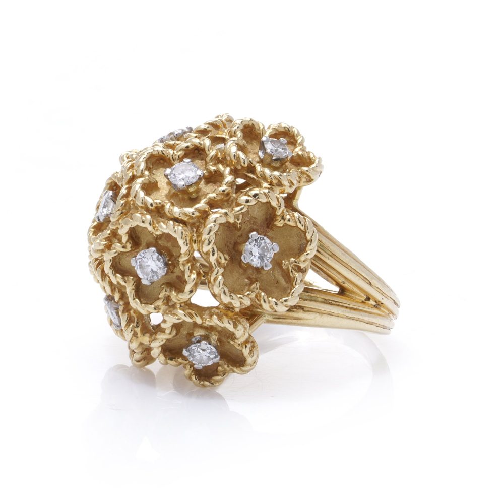 Vintage Kutchinsky Diamond Set 18ct Gold Flower Bombe Cocktail Ring, 18ct yellow gold floral cluster pattern with gold textured petals around diamond centres. Fully hallmarked, London 1977