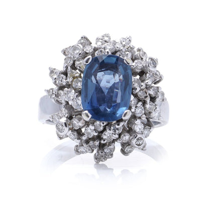 Sapphire and diamond cluster ring in white gold. 