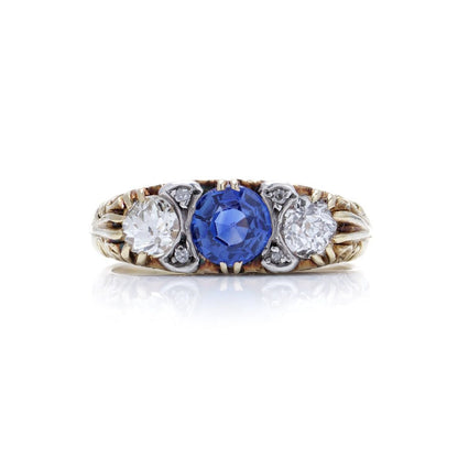 Antique sapphire and diamond three stone ring in gold and silver.