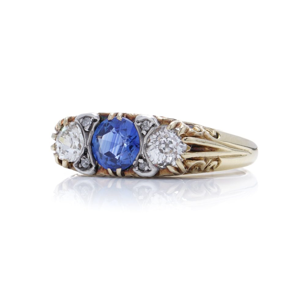 Victorian 18 Carat Gold And Silver Old Cut Diamond And Sapphire Three Stone Ring.
