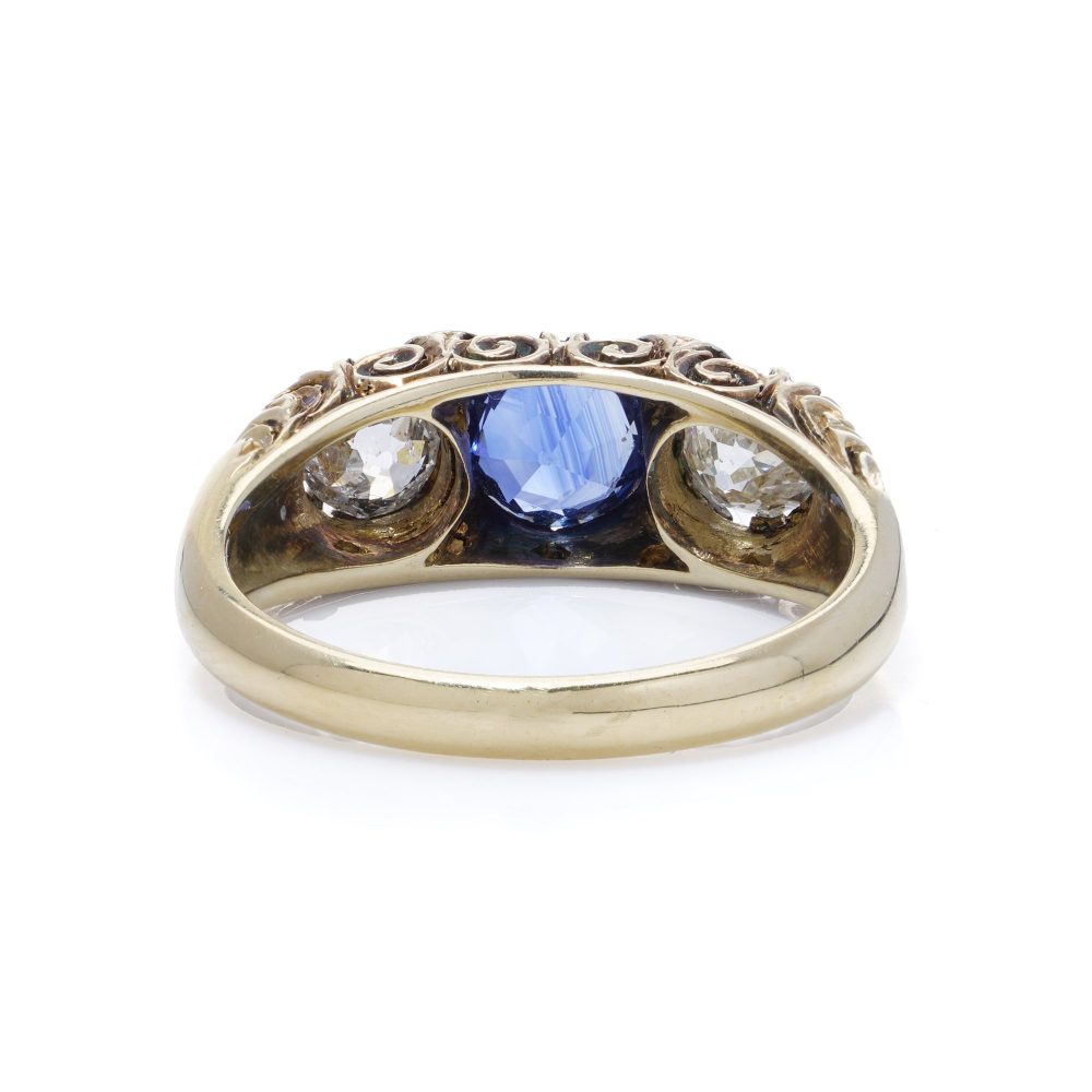 Victorian 18 Carat Gold And Silver Old Cut Diamond And Sapphire Three Stone Ring.