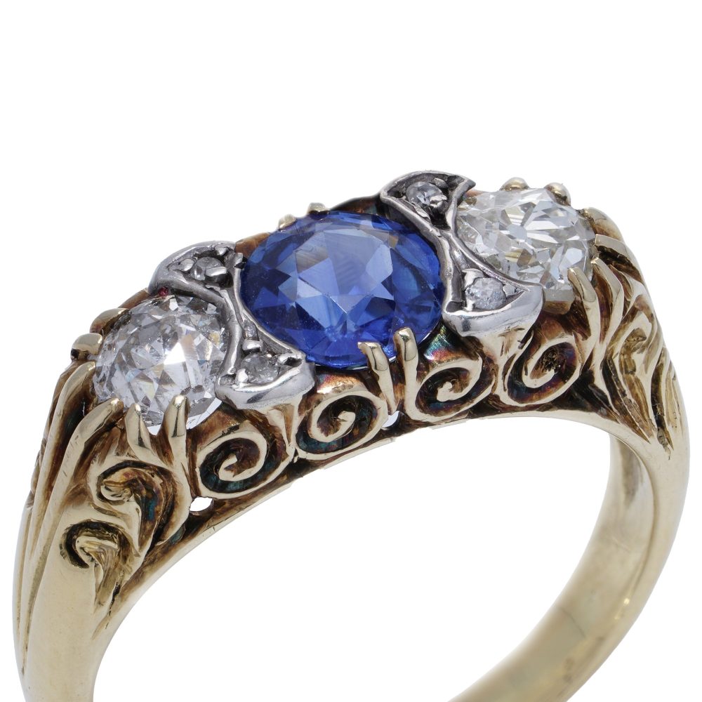 Victorian 18 Carat Gold And Silver Old Cut Diamond And Sapphire Three Stone Ring.