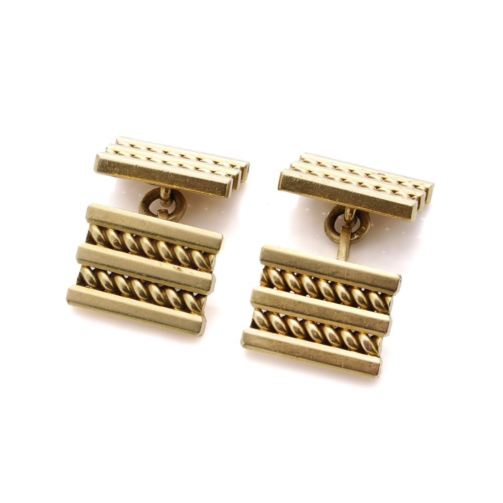 Vintage Cartier 18ct Yellow Gold Geometric Pattern Cufflinks, with clean lines and geometric shapes in a rope-like pattern. Circa 1970s - 1980s