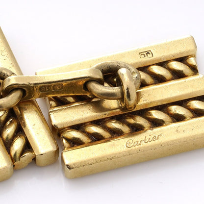 Vintage Cartier 18ct Yellow Gold Geometric Pattern Cufflinks, with clean lines and geometric shapes in a rope-like pattern. Circa 1970s - 1980s