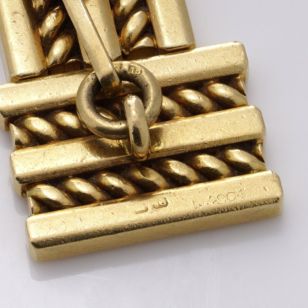 Vintage Cartier 18ct Yellow Gold Geometric Pattern Cufflinks, with clean lines and geometric shapes in a rope-like pattern. Circa 1970s - 1980s