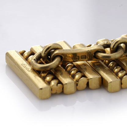 Vintage Cartier 18ct Yellow Gold Geometric Pattern Cufflinks, with clean lines and geometric shapes in a rope-like pattern. Circa 1970s - 1980s