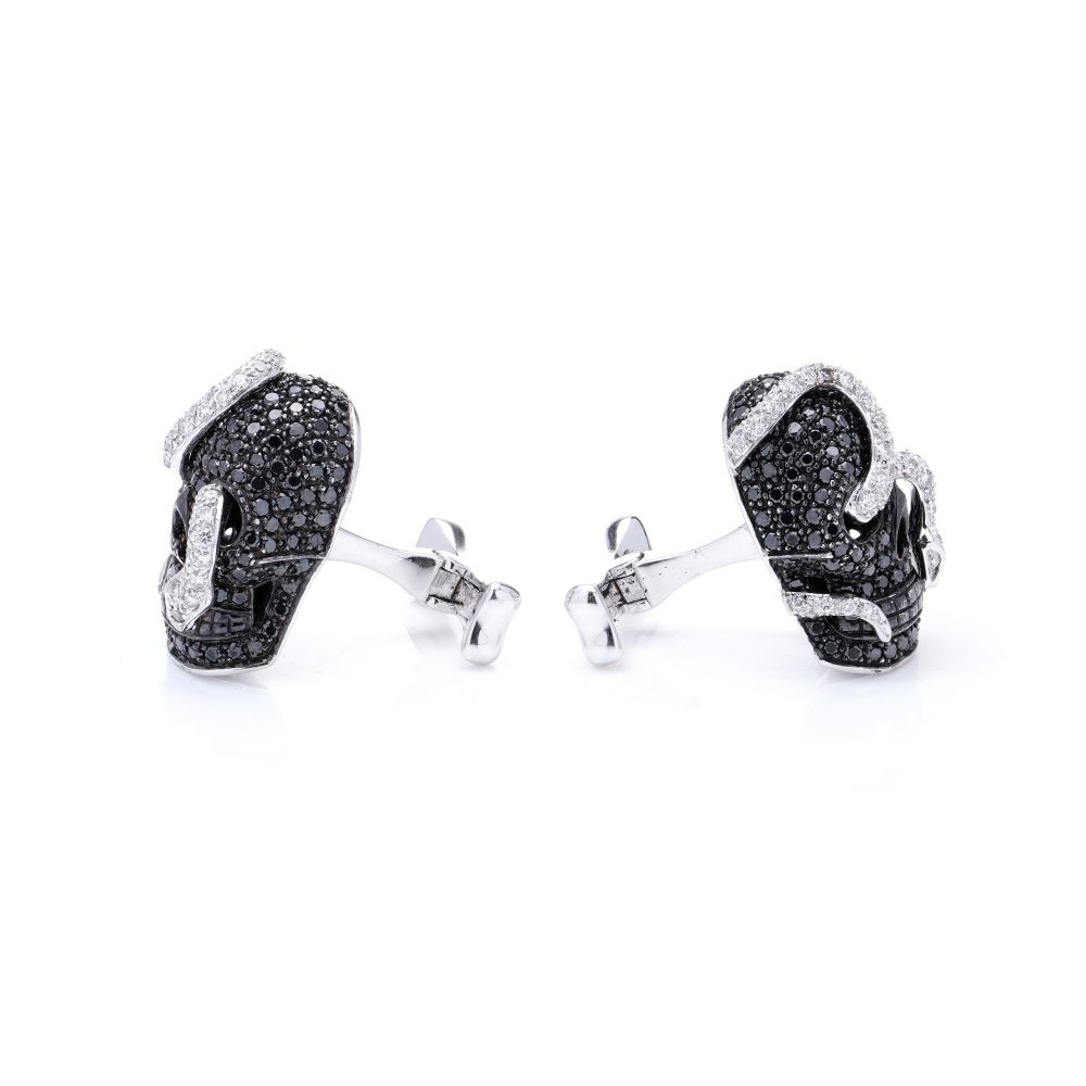 Theo Fennell 18 Carat Gold Black Diamond And Diamond Skull cufflinks
