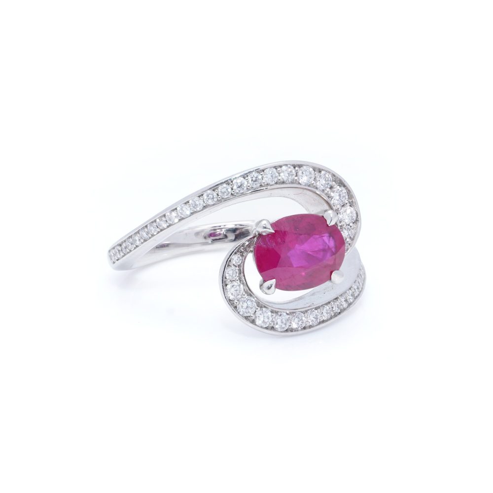 Vintage 1.20ct Ruby and Diamond Dress Ring, central 1.20ct oval red ruby surrounded by dynamic curve with pavé-set diamonds in platinum. Circa 1990s