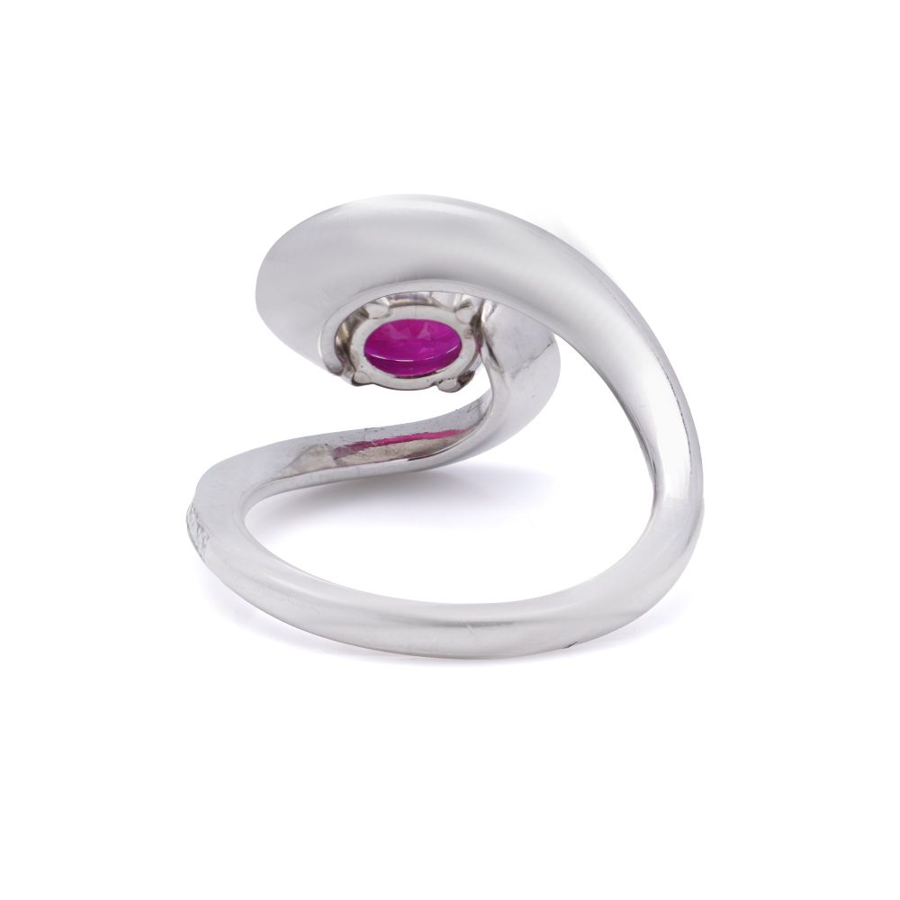 Vintage 1.20ct Ruby and Diamond Dress Ring, central 1.20ct oval red ruby surrounded by dynamic curve with pavé-set diamonds in platinum. Circa 1990s
