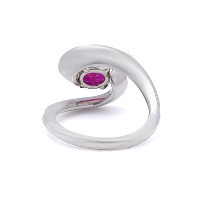 Vintage 1.20ct Ruby and Diamond Dress Ring, central 1.20ct oval red ruby surrounded by dynamic curve with pavé-set diamonds in platinum. Circa 1990s