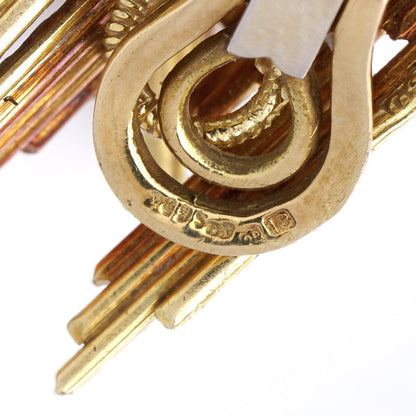 Yellow and white gold earrings with diamonds.