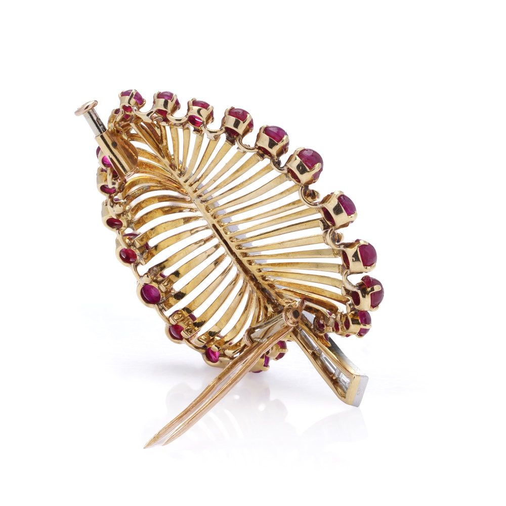 Vintage gold and platinum diamond and ruby leaf brooch.
