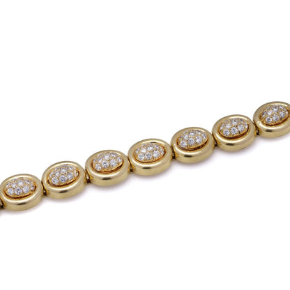 Van Cleef & Arpels gold and diamond link bracelet.