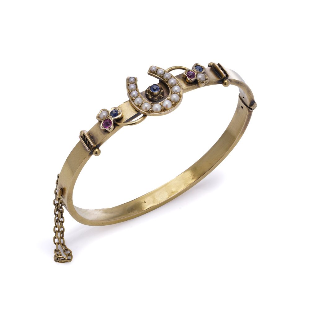 Victorian 15 Carat Yellow Gold Bangle With A Horseshoe And Gemstones