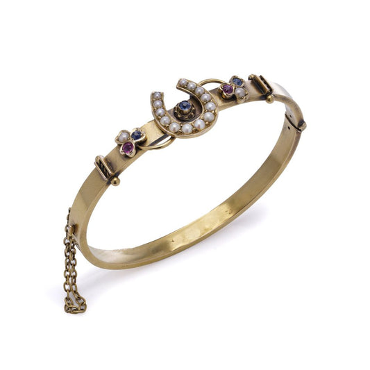 Victorian 15 Carat Yellow Gold Bangle With A Horseshoe And Gemstones