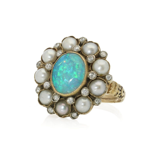 Vintage gold cluster ring with opal, pearls and diamonds.