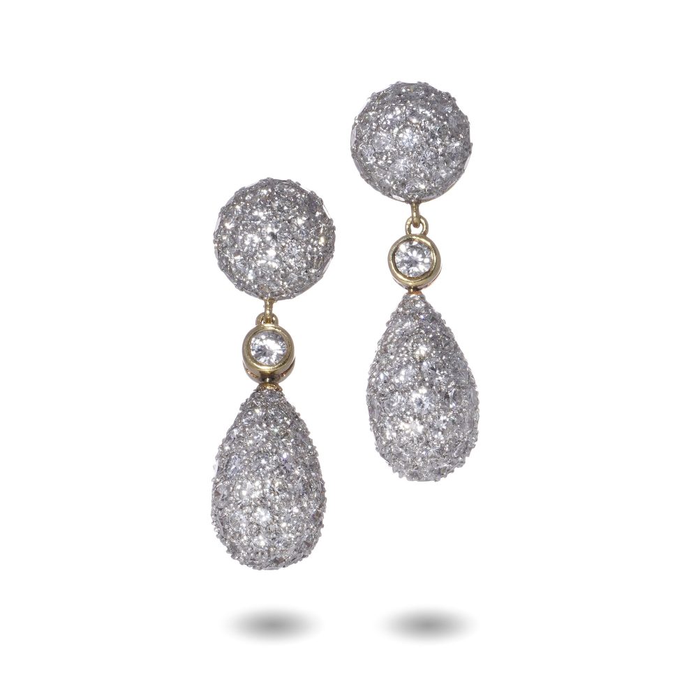Diamond drop earrings in yellow and white gold.