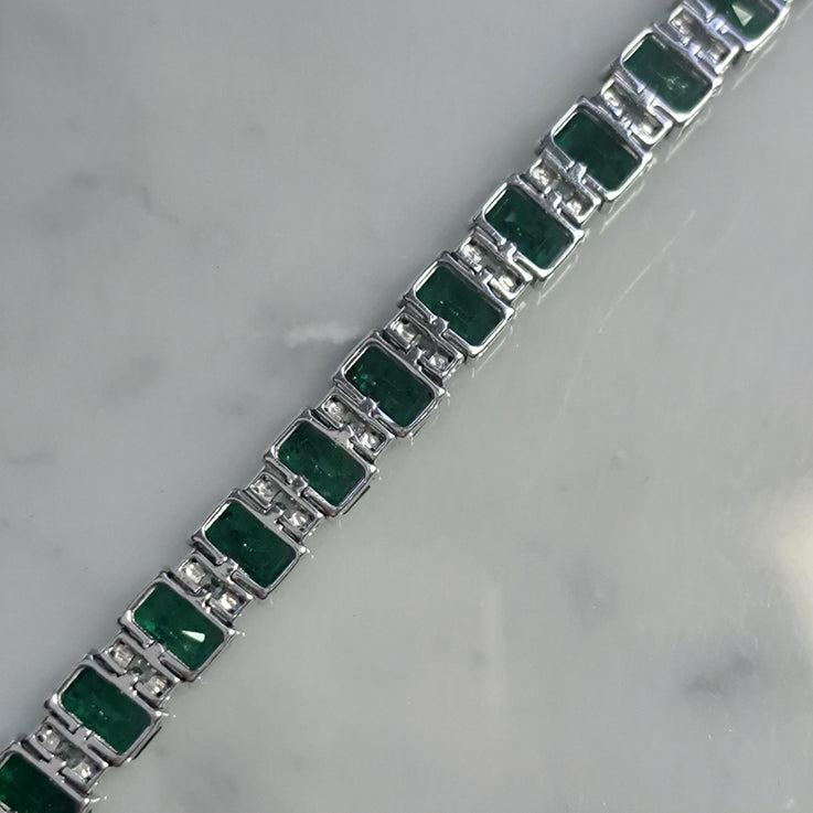 14.15ct Emerald Cut Emerald and Diamond Line Tennis Bracelet