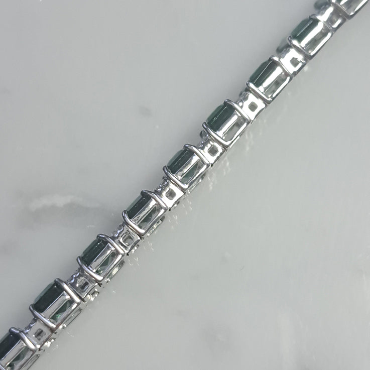 14.15ct Emerald Cut Emerald and Diamond Line Tennis Bracelet