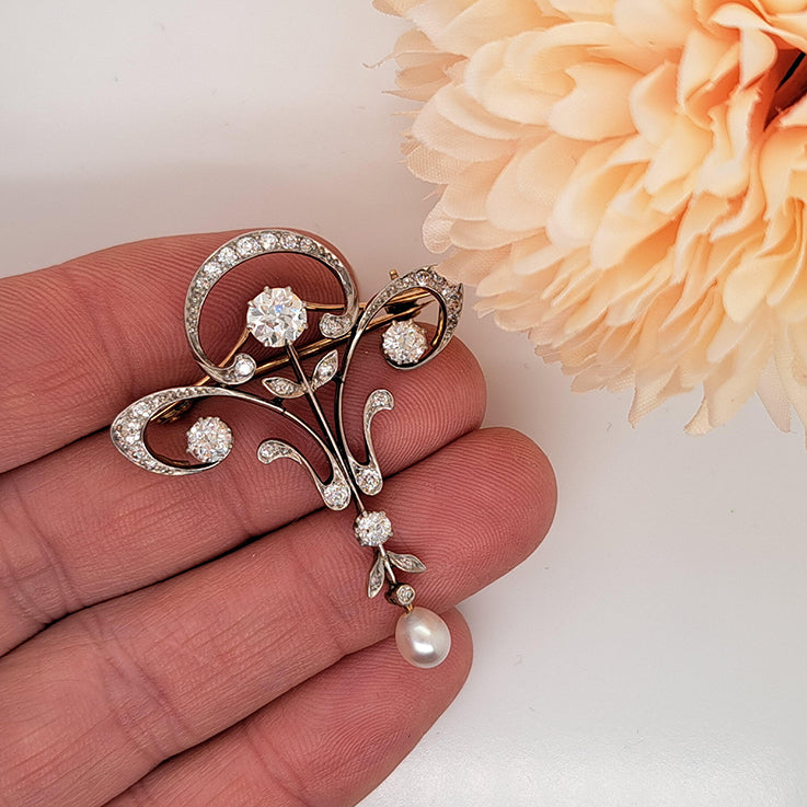 Antique Art Nouveau 1.60ct Old Cut Diamond and Pearl Pendant come Brooch in platinum upon yellow gold. Circa 1870