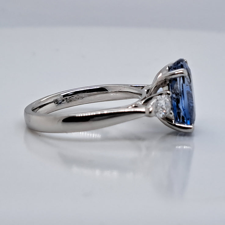 4.80ct Oval Sri Lanka Sapphire and Pear Cut Diamond Trilogy Three Stone Engagement Ring in platinum