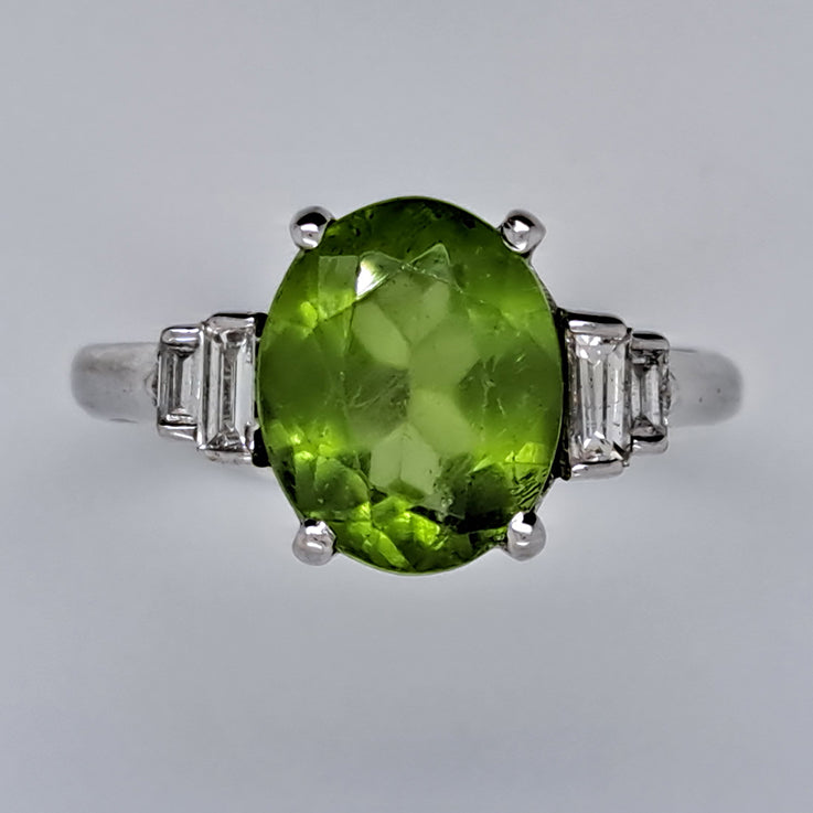 Oval Peridot and Baguette Diamond Engagement Ring in 18ct White Gold