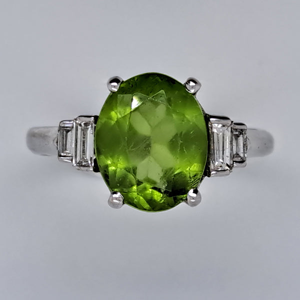 Oval Peridot and Baguette Diamond Engagement Ring in 18ct White Gold