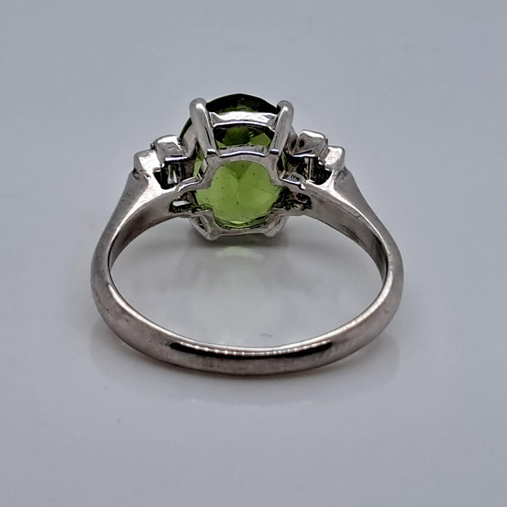 Oval Peridot and Baguette Diamond Engagement Ring in 18ct White Gold