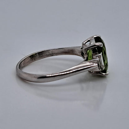 Oval Peridot and Baguette Diamond Engagement Ring in 18ct White Gold