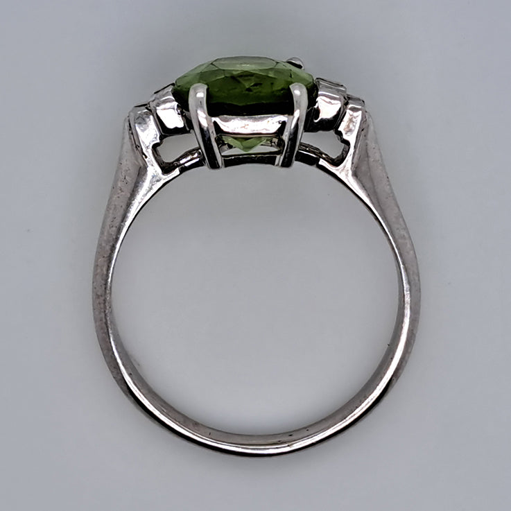 Oval Peridot and Baguette Diamond Engagement Ring in 18ct White Gold