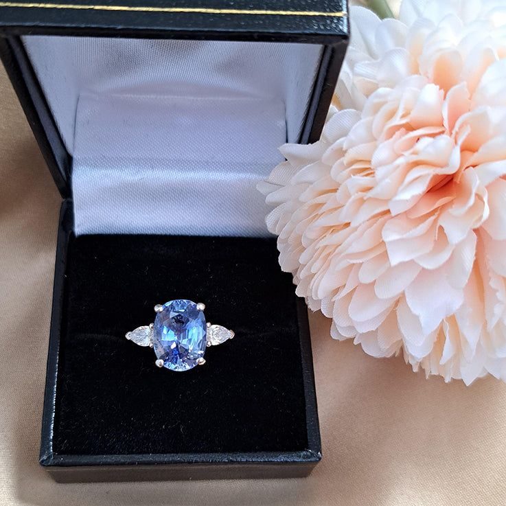 4.80ct Oval Sri Lanka Sapphire and Pear Cut Diamond Trilogy Three Stone Engagement Ring in platinum