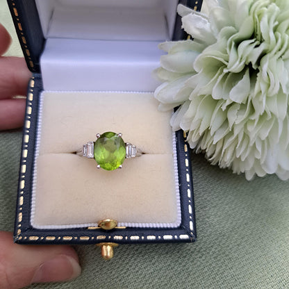 Oval Peridot and Baguette Diamond Engagement Ring in 18ct White Gold