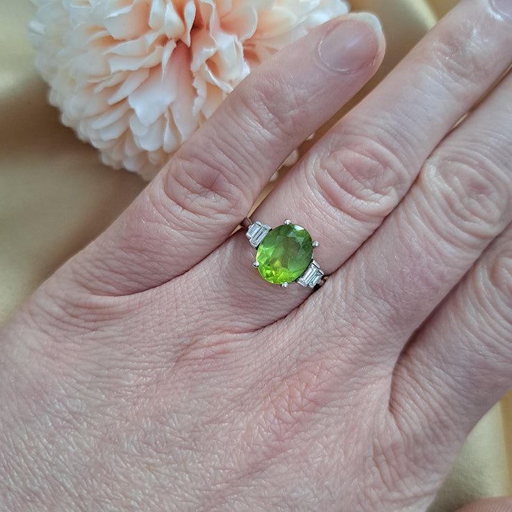 Oval Peridot and Baguette Diamond Engagement Ring in 18ct White Gold