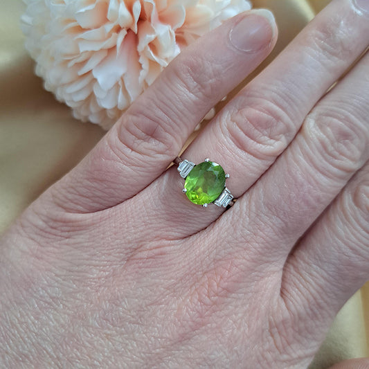 Oval Peridot and Baguette Diamond Engagement Ring in 18ct White Gold