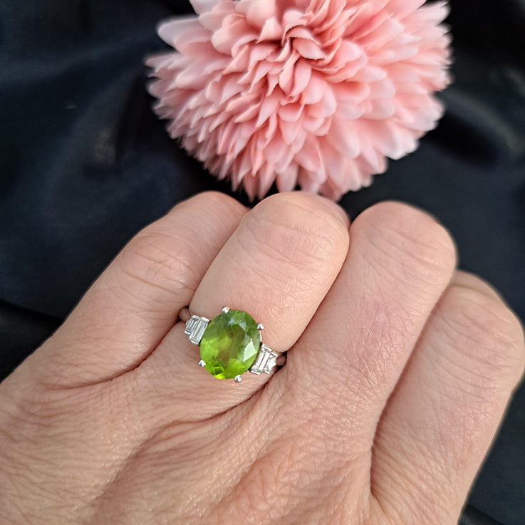 Oval Peridot and Baguette Diamond Engagement Ring in 18ct White Gold